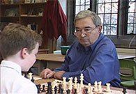 Roman Pelts FIDE trainer with student
