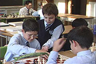 Students playing chess